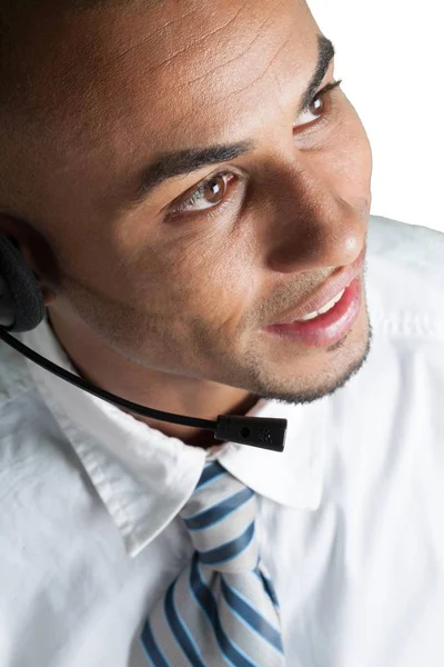 Homem sorridente com fone de ouvido — Fotografia de Stock