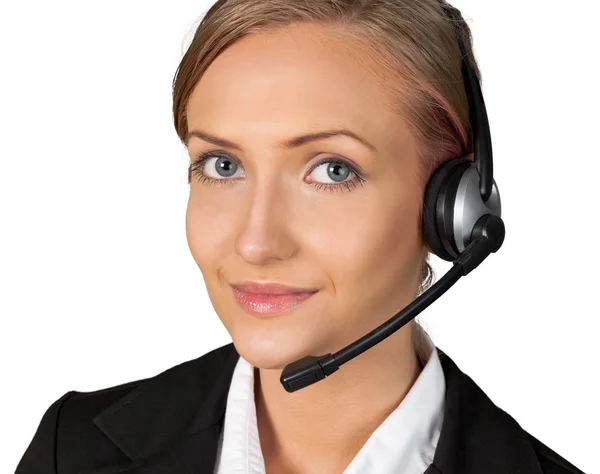 Joven mujer de negocios en auriculares — Foto de Stock