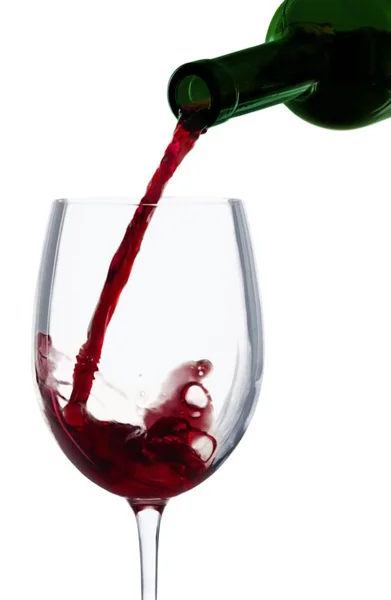 Red wine pouring in glass — Stock Photo, Image