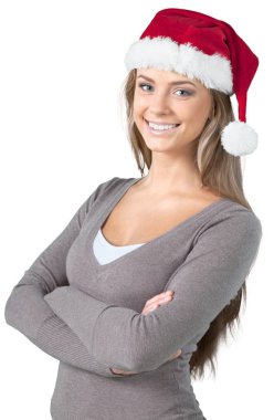 Noel Baba şapkalı genç kadın.