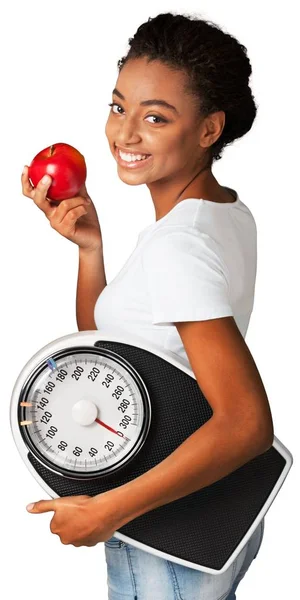 Young woman with scales — Stock Photo, Image