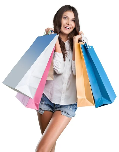 Mujer joven con bolsas de compras — Foto de Stock