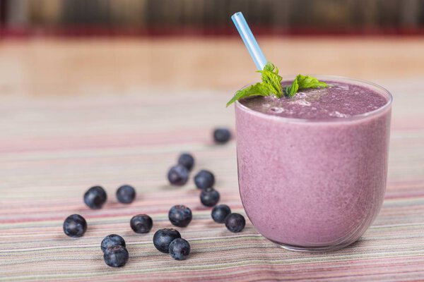 Glass of blueberry smoothie