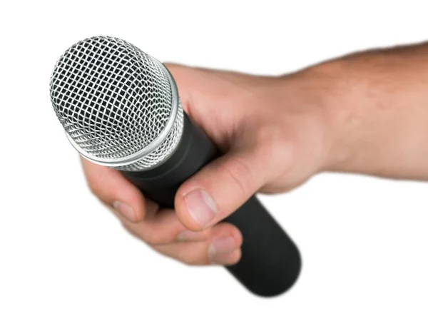 Mão segurando microfone — Fotografia de Stock