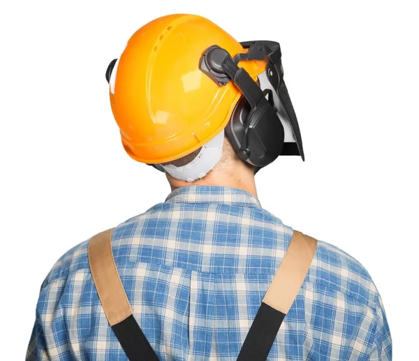 Homme en uniforme de travail et casque — Photo