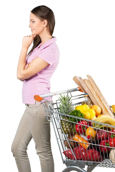 Glückliche Frau mit Einkaufswagen — Stockfoto