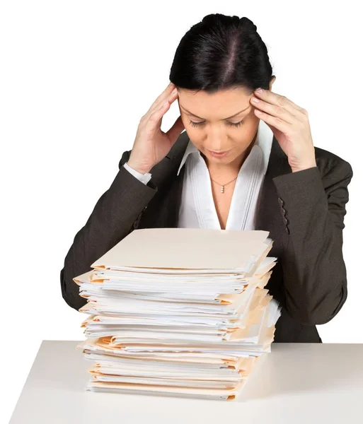 Business woman with stack of documents — стоковое фото