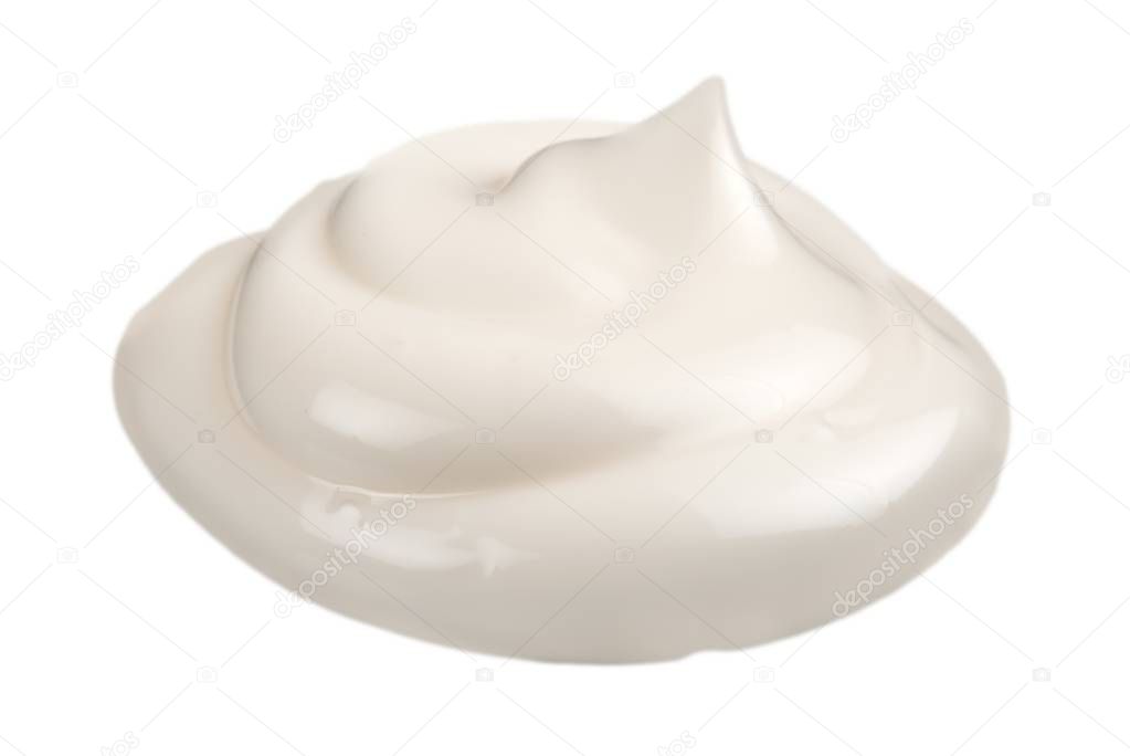 Cosmetic cream swirl isolated on white background