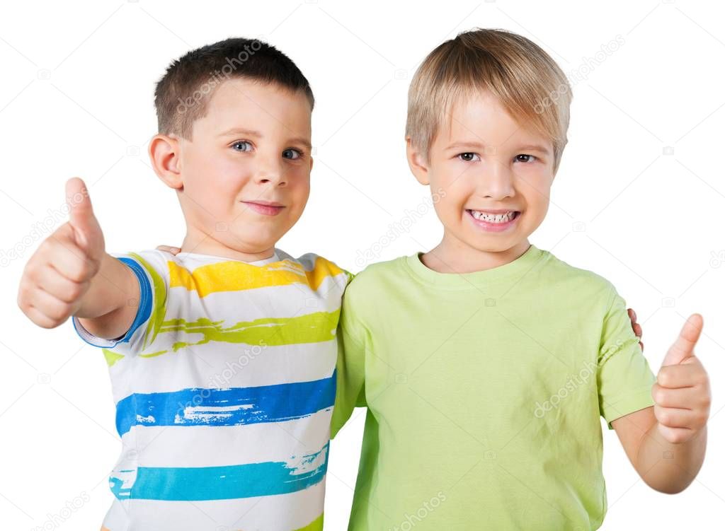little boys showing thumbs up isolated on white background 