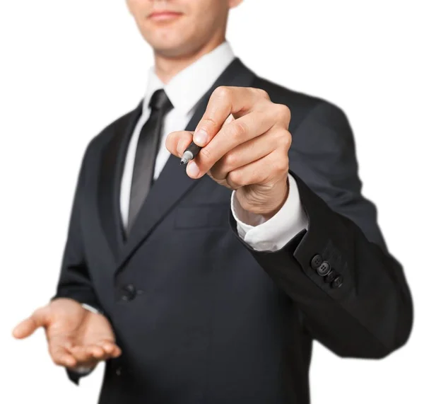 白い背景に分離されたペンを持つスーツを着た若いビジネス男 — ストック写真
