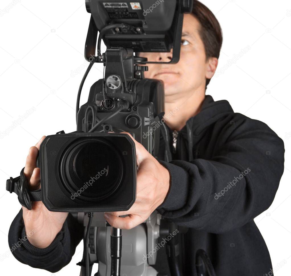 Cameraman working with camera  