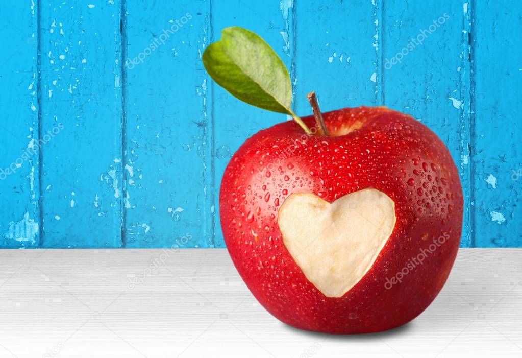 apple with carved heart sign