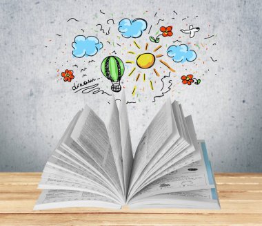 Masanın üzerinde kitabı aç