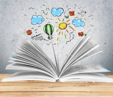 Masanın üzerinde kitabı aç