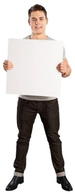 Beyaz tahta üzerinde beyaz arka plan izole tutan genç yakışıklı adam 