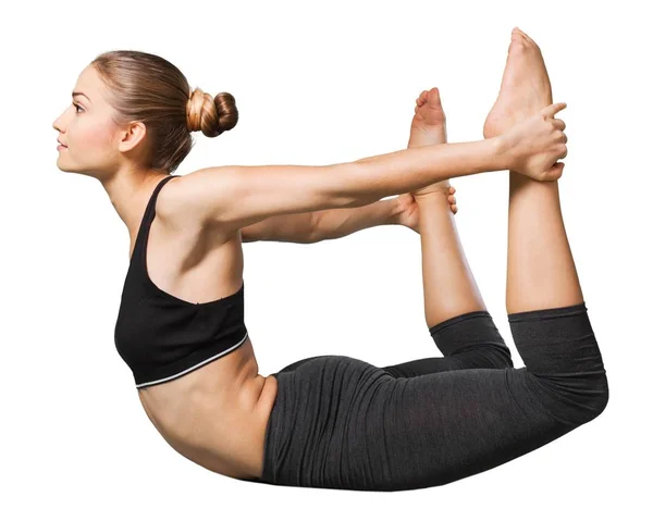 Vrouw presterende yoga oefening — Stockfoto
