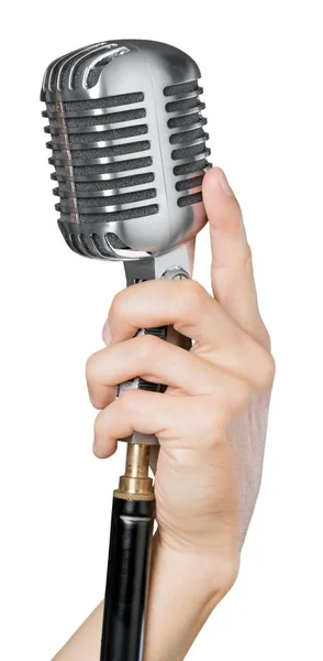 Hand holding microphone — Stock Photo, Image