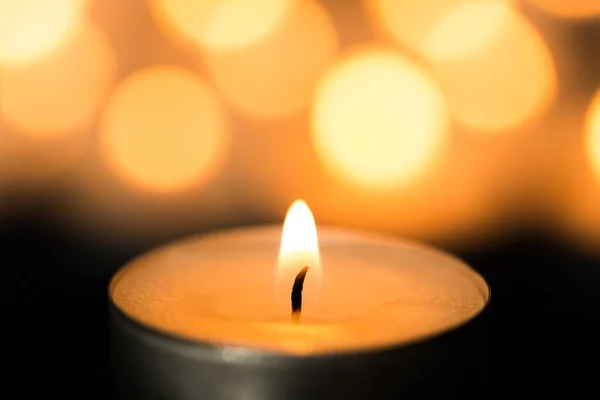 Christmas candle burning at night — Stock Photo, Image