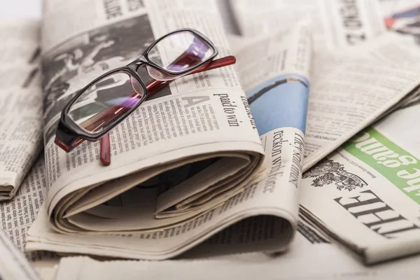 Pile of newspapers on  background — Stock Photo, Image