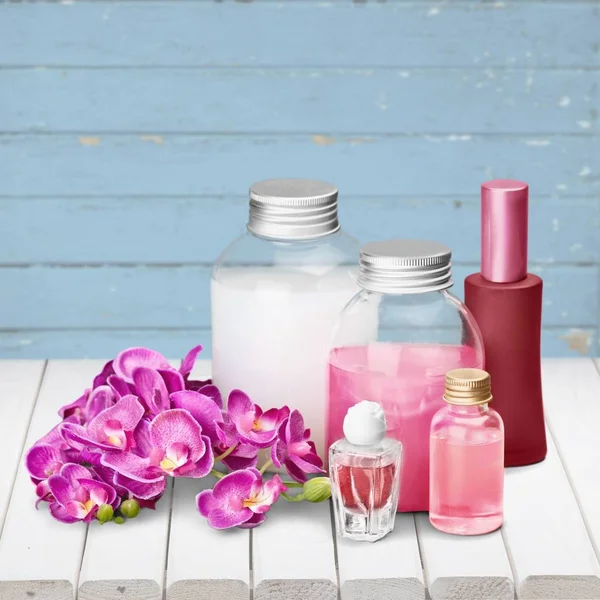 Cosmetic containers and flowers