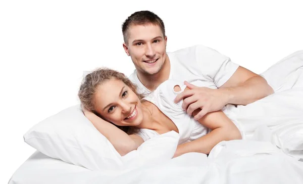 Junges Paar Bett Isoliert Auf Weißem Hintergrund — Stockfoto