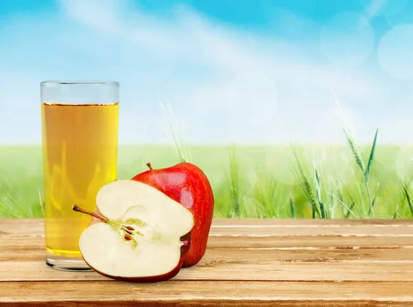 Glass of delicious apple juice — Stock Photo, Image