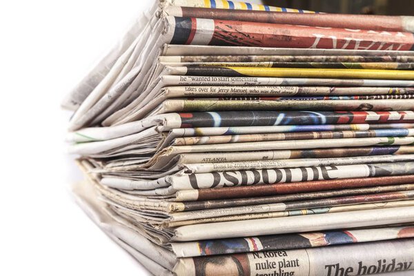 pile of newspapers on  background