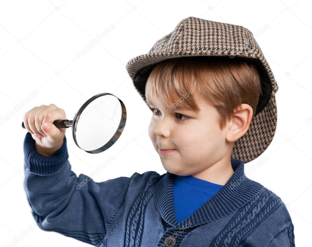 boy with magnifying glass