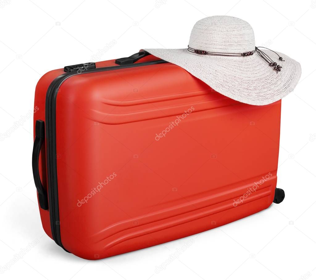 suitcase with straw hat isolated on white background 