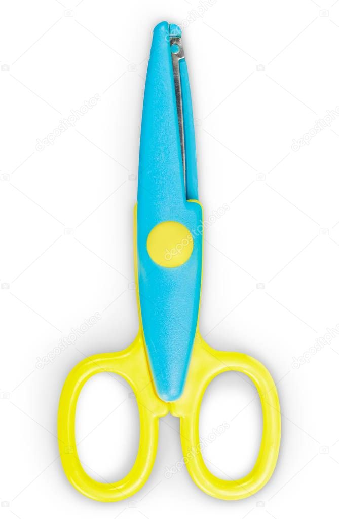 Open scissors on white 