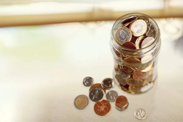 Money Jar with coins