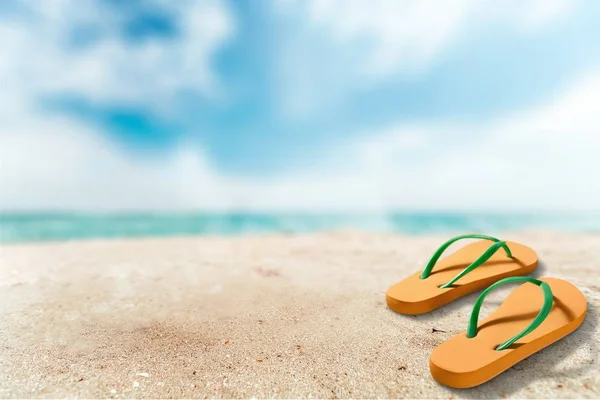 Chanclas en la playa — Foto de Stock