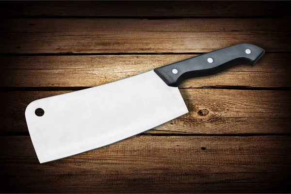Dřevěné řezací prkno a nůž — Stock fotografie
