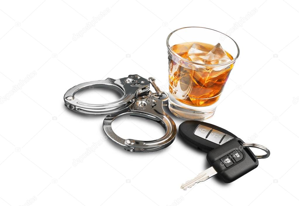Whiskey with car keys and handcuffs