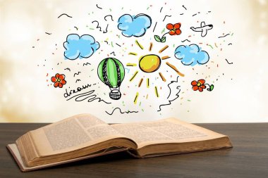 Masanın üzerinde kitabı aç