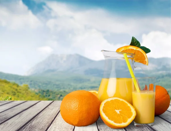 Glass of delicious orange juice — Stock Photo, Image