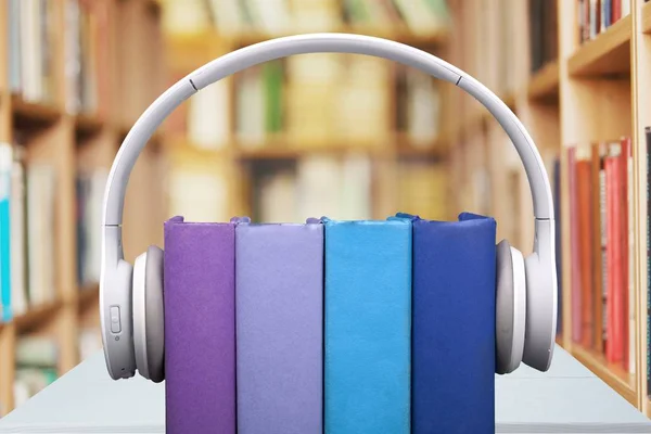 Stack of Books and headphones — Stock Photo, Image