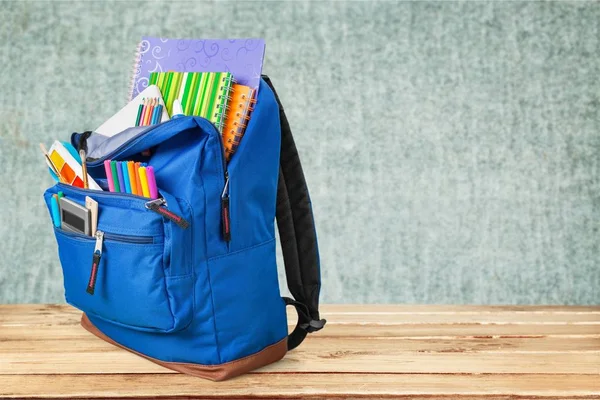 School Backpack with stationery — Stock Photo, Image