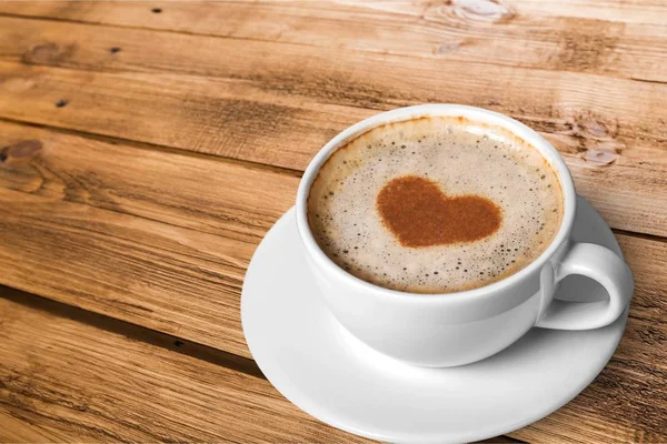 Coffee with heart shaped foam — Stock Photo, Image
