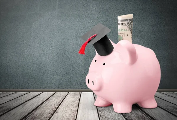 Piggy Bank with Graduation Hat and diploma