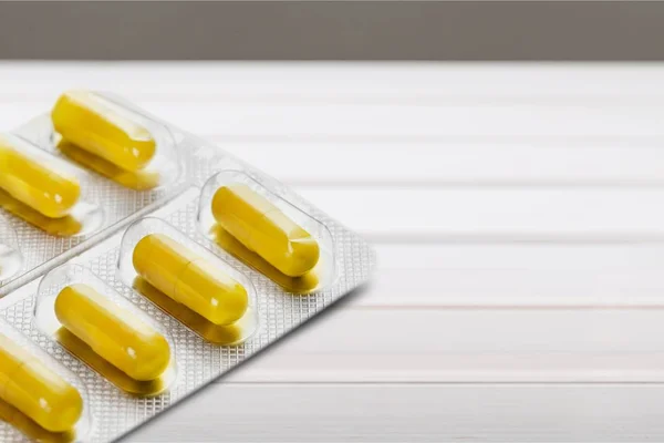 Pílulas de gelatina amarela — Fotografia de Stock