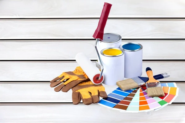 Paint brushes and paint cans — Stock Photo, Image