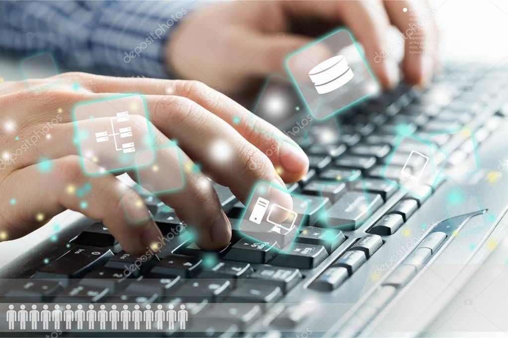 hands using black keyboard