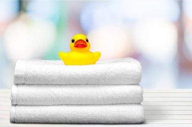 Bath towels and Yellow rubber duck clipart