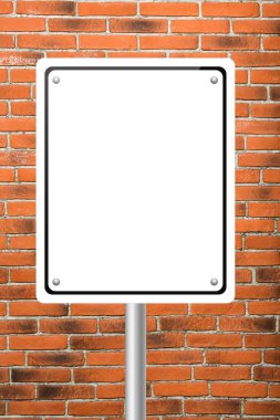 Beyaz boş yol işaret tuğla duvarın üzerinden