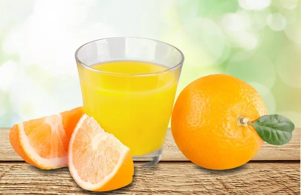 Glass of delicious orange juice — Stock Photo, Image