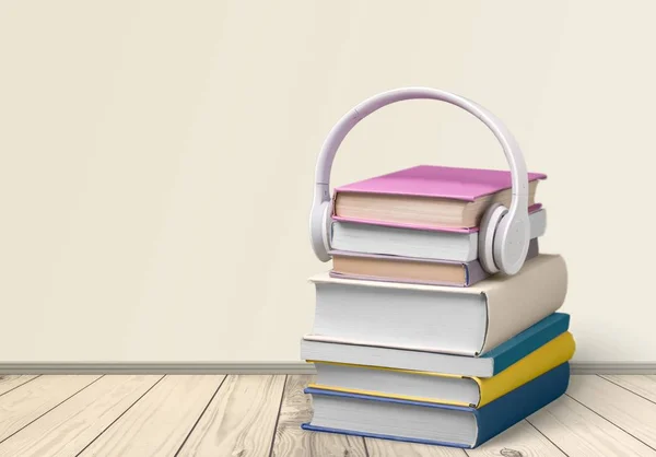 Stack of Books and headphones — Stock Photo, Image