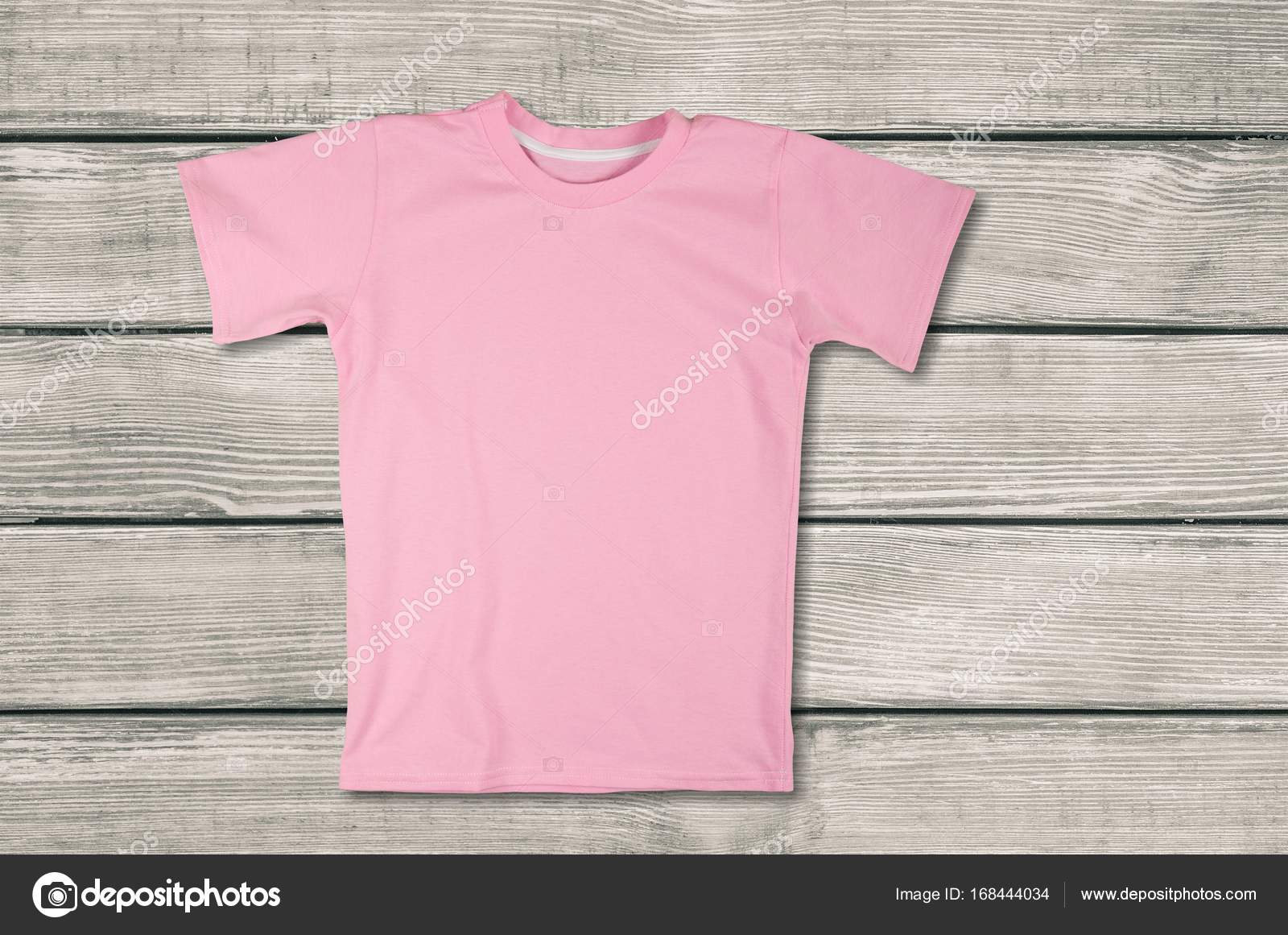Blank Pink Shirt Wooden Background Stock Photo by ©billiondigital