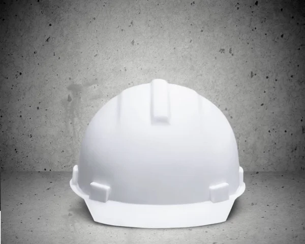 Bílá helma na stole — Stock fotografie