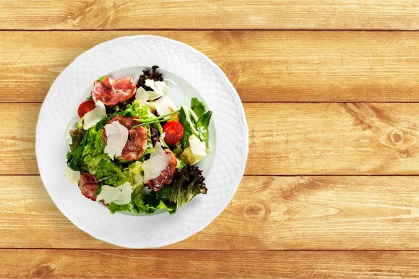 Tasty Salad Plate Wooden Background — Stock Photo, Image